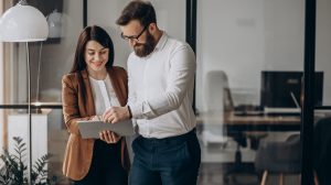 Two business partners working in office